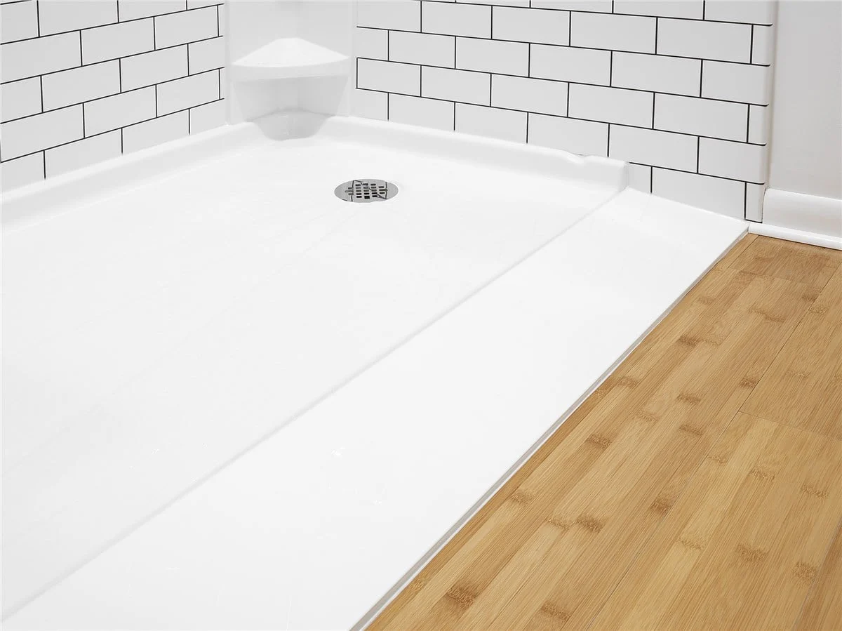 Anti-slip low-threshold shower base