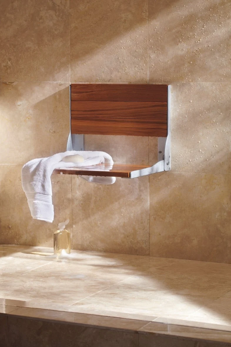 Fold-down shower seat