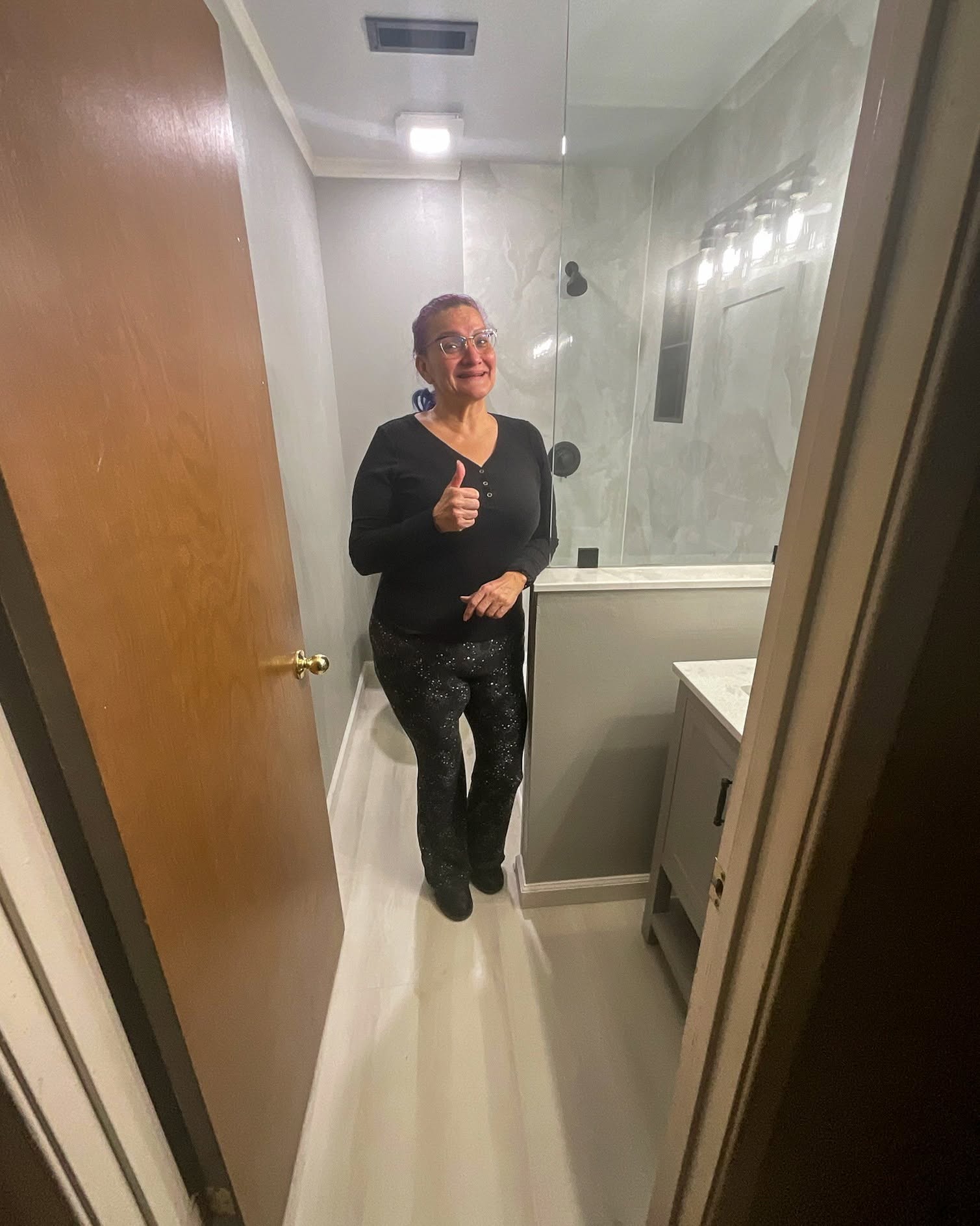 Happy customer with their new walk-in shower